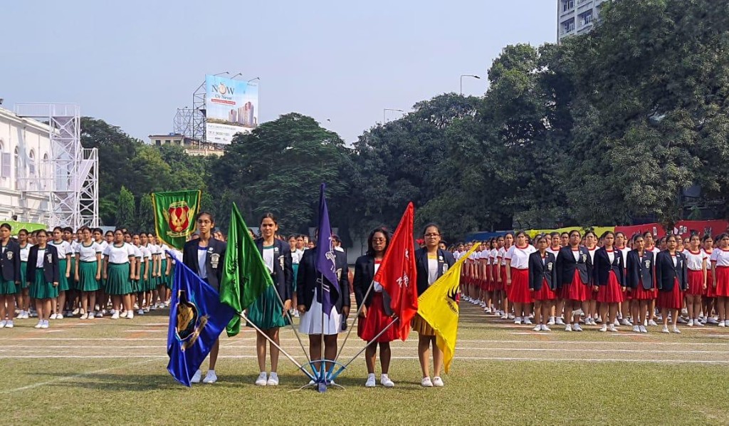 House captains holding house flags on sports day